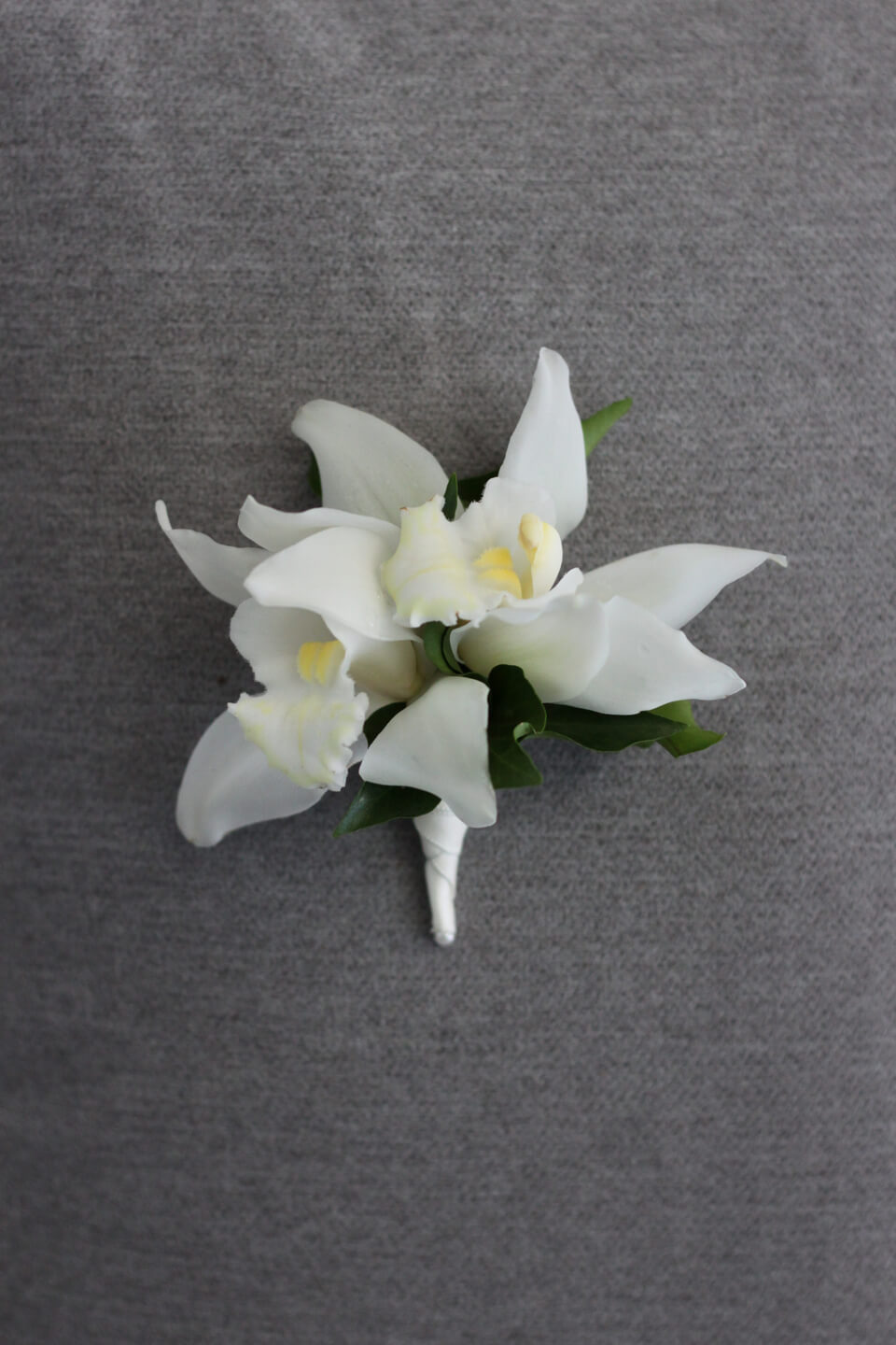 Family-pin-on-corsage-white